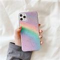 Rainbow gradient striped flexible TPU case for iPhone on a white background.