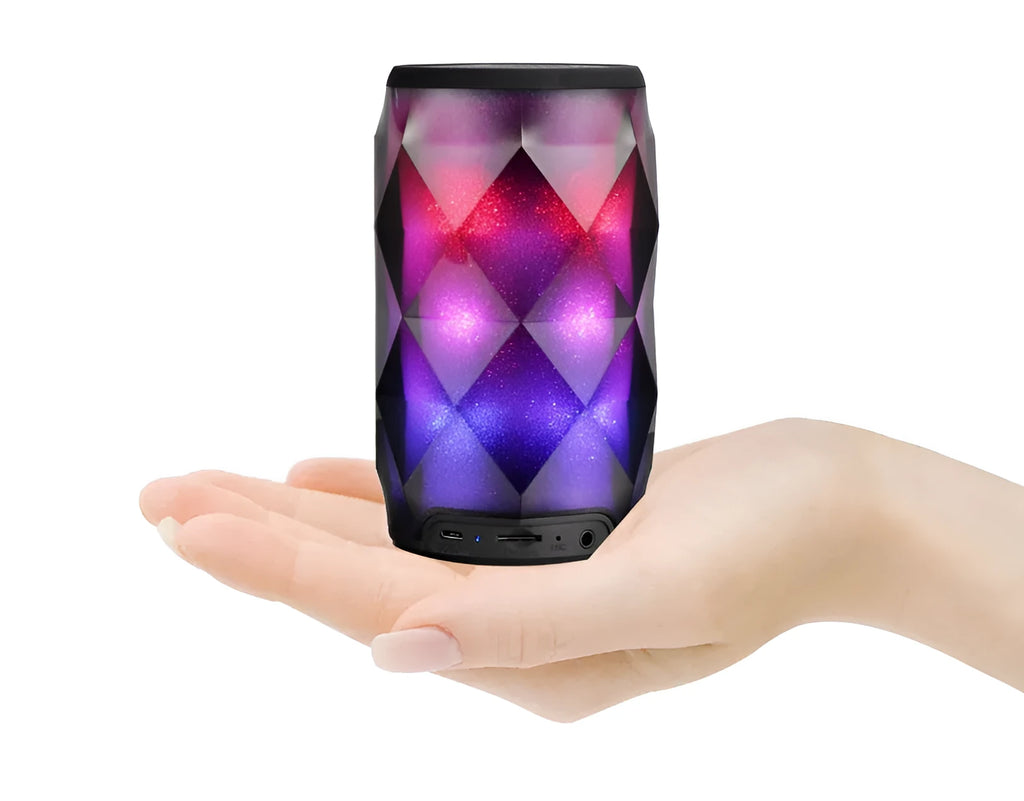 Black crystal diamond cut Coca-Cola can Bluetooth speaker lantern with colourful LED lights illuminated.