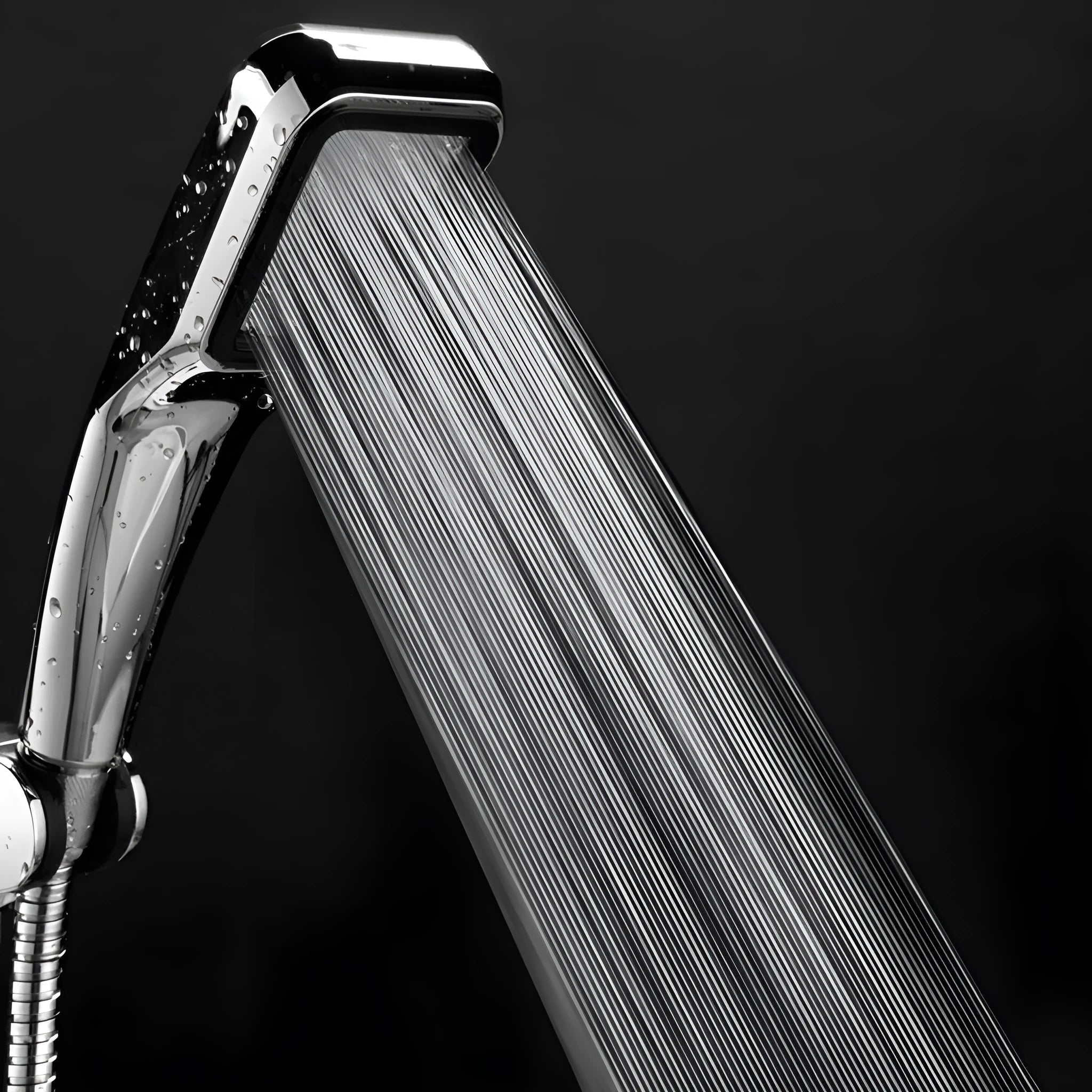 Orange hand-held shower head with hose for rain shower function