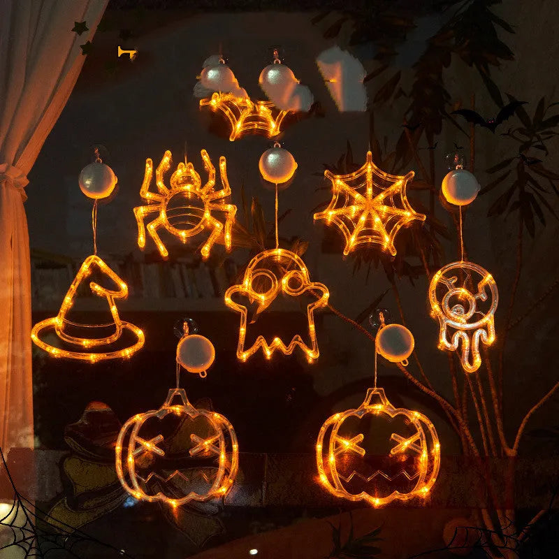 Seven Halloween-themed battery LED window lights with spiders, pumpkins, ghosts on suction cups