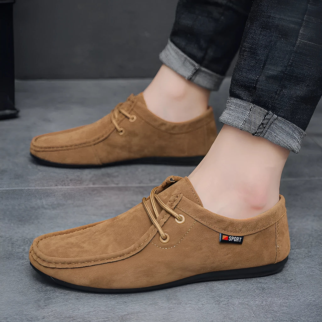 Men's casual slip-on loafers in brown with round toe, stitching, and non-slip plastic outsole