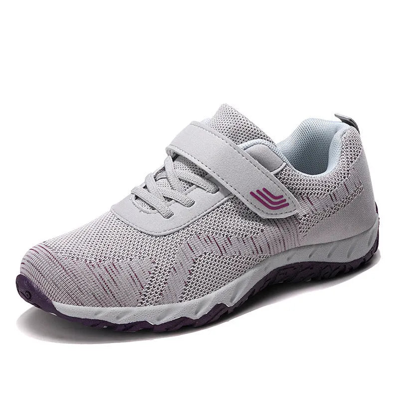 Women's low-top casual shoes with wedge heel, mesh upper, and Velcro closure in solid colours
