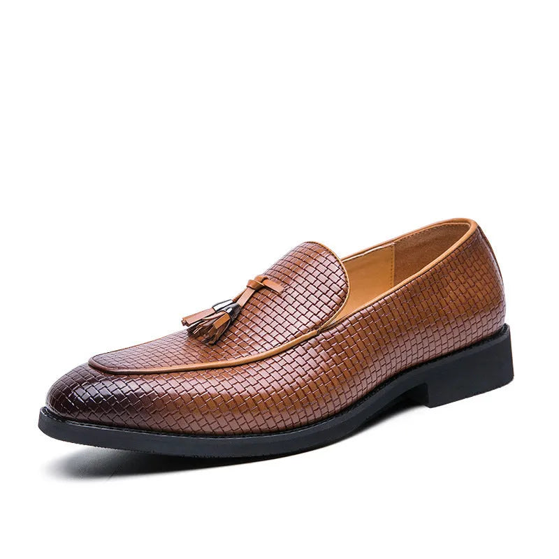 Men's black pointed toe slip-on loafers with a tassel detail on the artificial PU upper.