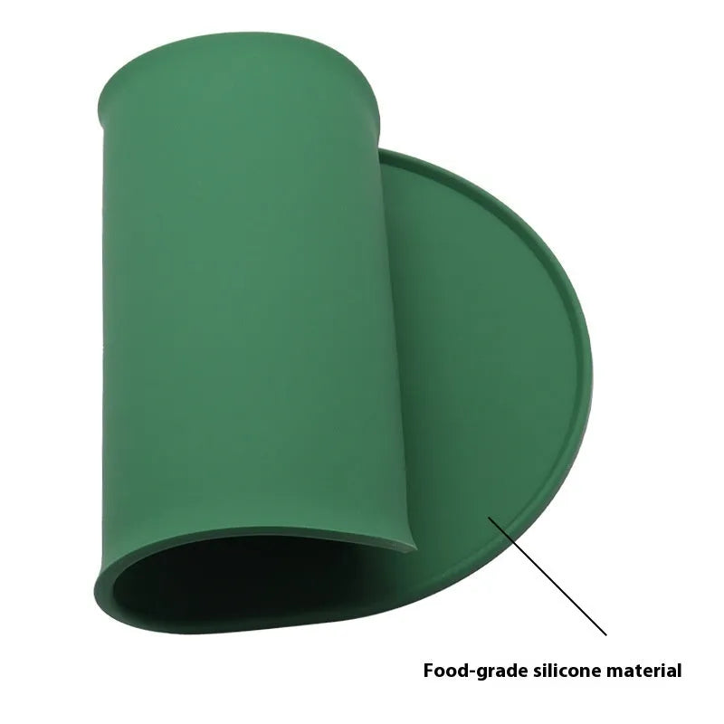 Silicone waterproof cat feeding placemat in beige colour showing placement beneath food bowl