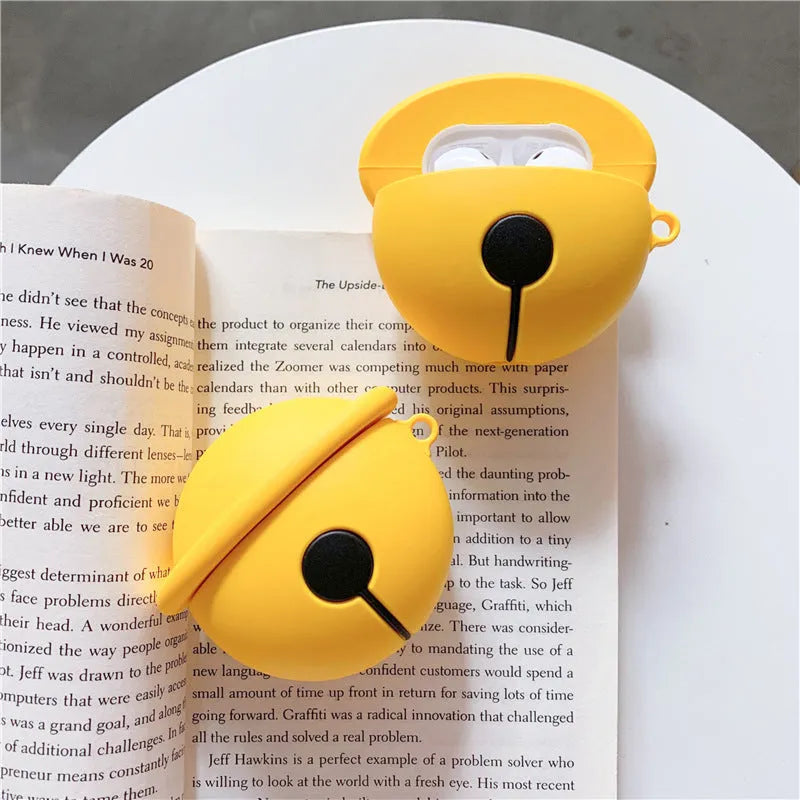 Yellow silicone AirPods case with bell charm for 1st and 2nd generation models