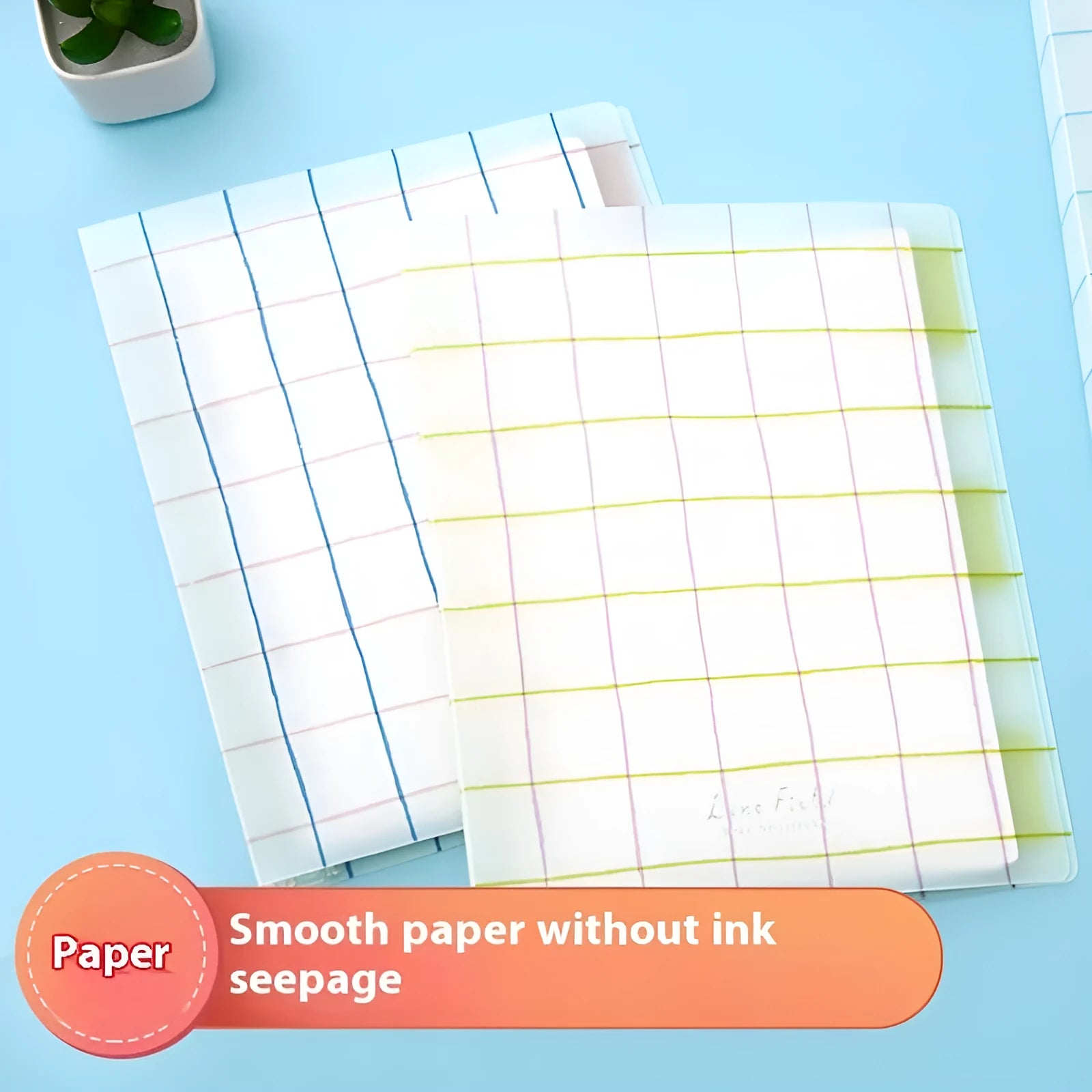 Refillable spiral notebook in pastel blue with loose-leaf paper visible.