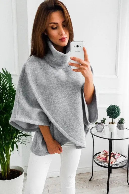 Women's long black batwing sleeve cardigan sweatshirt with button front and stitch detail