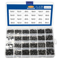 Assortment of small black countersunk head machine screws with cross-head drives for laptop repair.