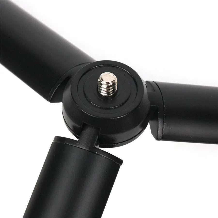 Black aluminium mobile tripod stabiliser compatible with Apple iPhone for handheld photography