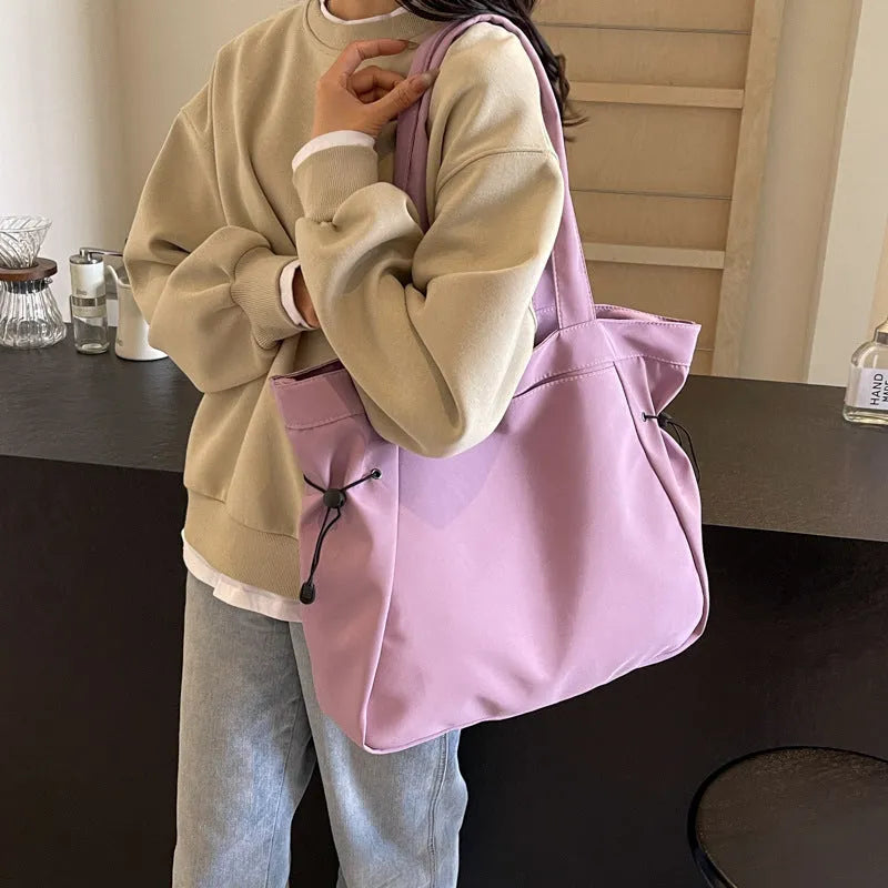 Soft Oxford cloth folding tote bag shown in multiple colours: black, brown, grey, and purple.