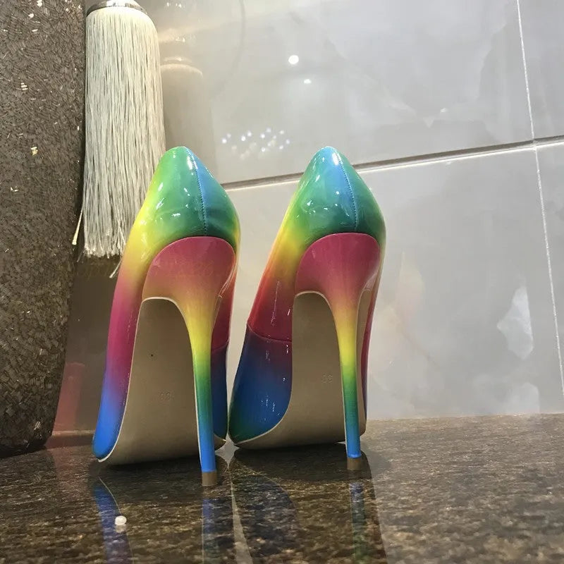 Rainbow multicolour patent leather women's stiletto heels with pointed toe on a white background