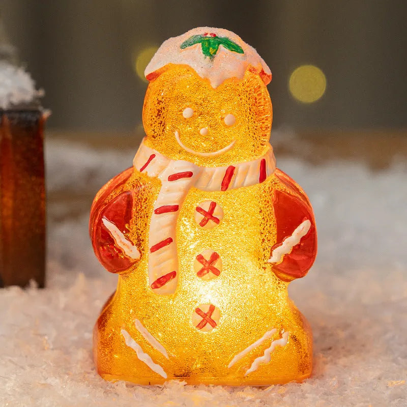 Glowing Christmas gingerbread man snowman ornament in plastic with four colour variations including clear, white and red scarf options