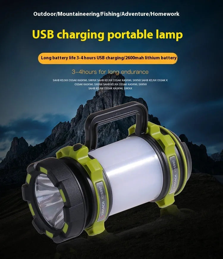 Green KS-5992AC portable LED searchlight with 5W headlight and 3W side light on outdoor background