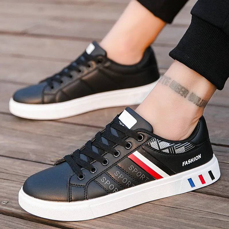 Sports shoes in black grey and white showing Asian sizes 39 to 44 for running and training