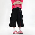 Retro denim workwear shorts with wide leg design and multiple pockets in red and black colours
