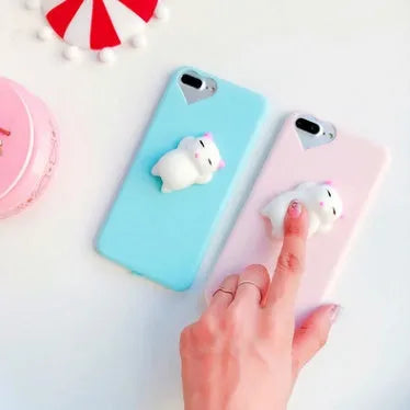 3D cartoon cat design silicone iPhone case in multiple colours showing soft TPU construction