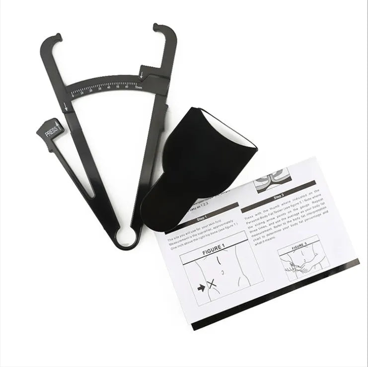Black ABS plastic body fat caliper skinfold tester with measuring tape on a grey background.