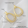 Yellow gold geometric women's drop earrings with a ring design and zircon detail on a white background.