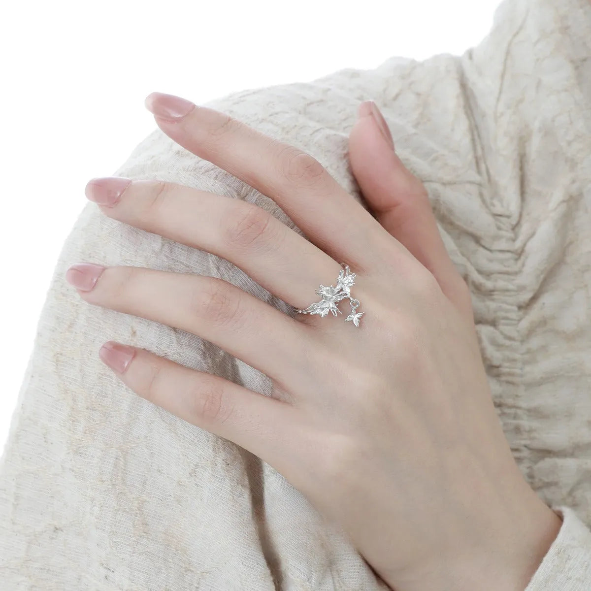 Silver butterfly ring with adjustable opening in gold-colour finish
