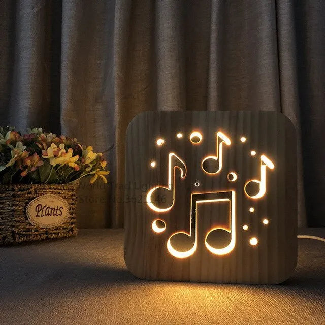 Square pine wood USB LED atmosphere lamp emitting warm white light from its 3D design.