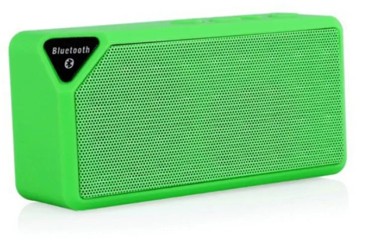 Cannon X3 small cube-shaped wireless Bluetooth portable speaker shown in one of five colours: black, blue, green, red, or yellow.