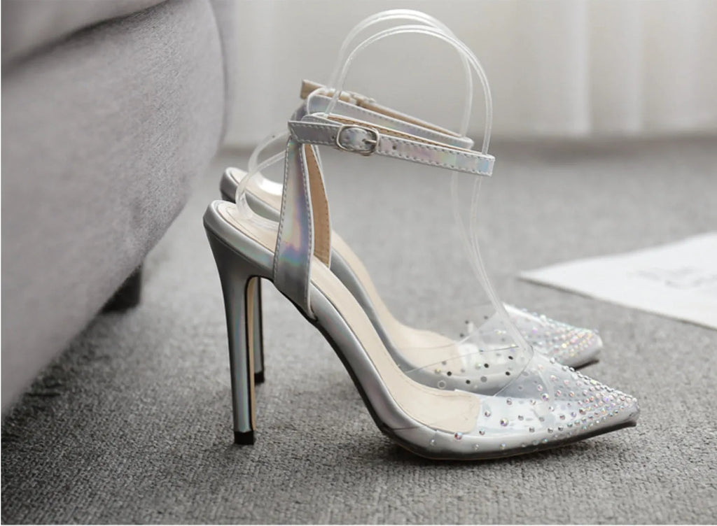 Women's pointed diamond pattern sandals with a stiletto heel, shown in size 38 with a PVC upper.