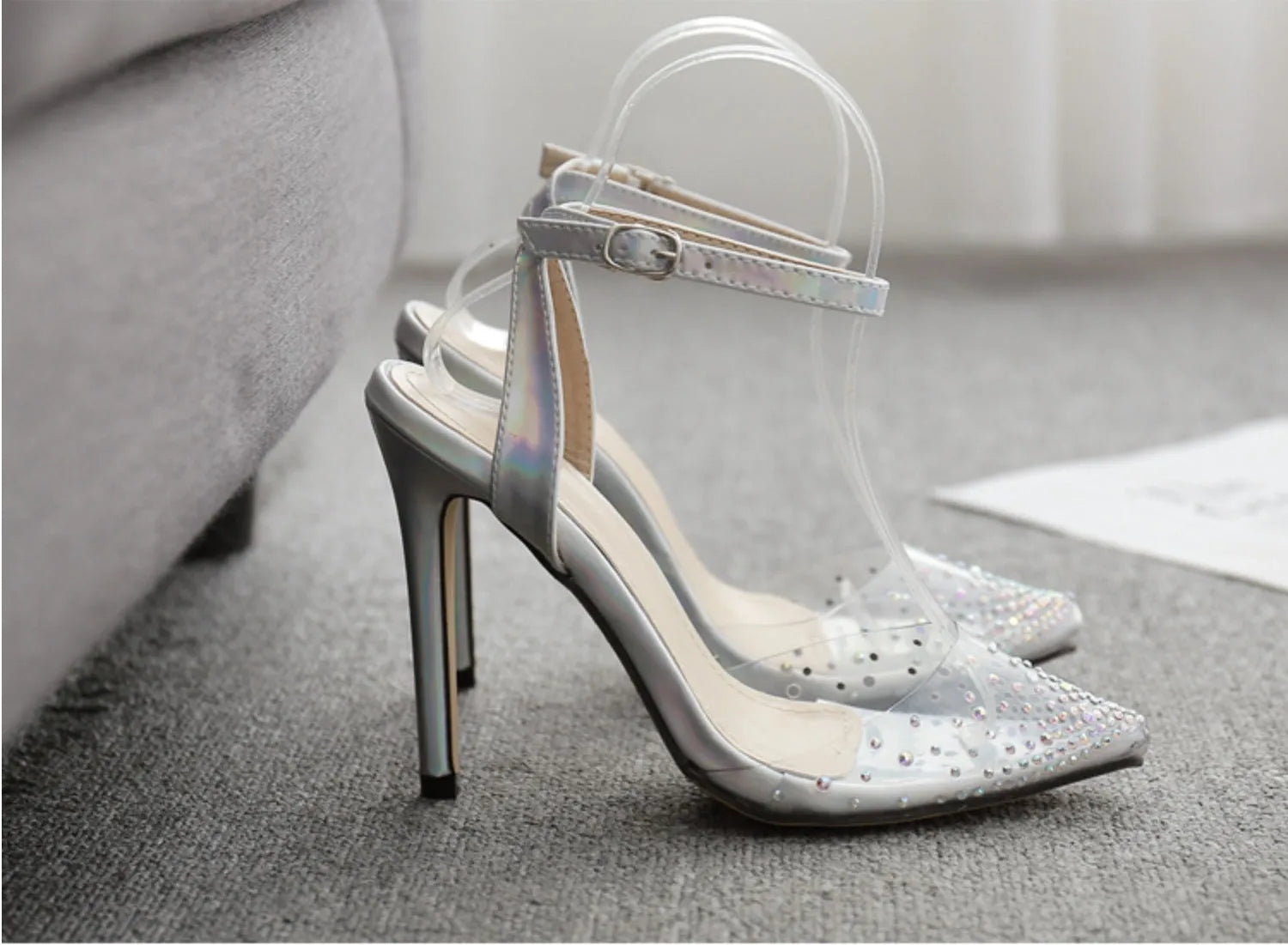Women's pointed diamond pattern sandals with a stiletto heel, shown in size 38 with a PVC upper.