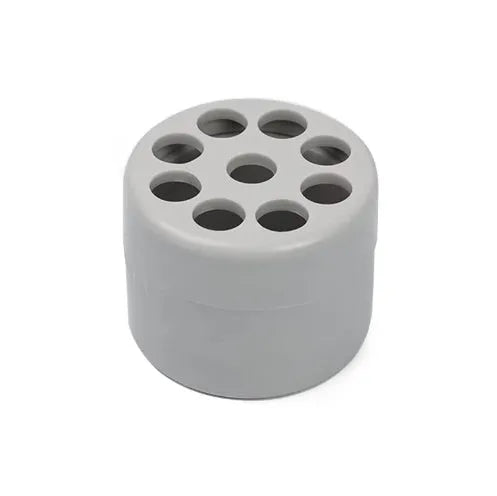 Three spiral stem brackets in green, light gray, and yellow placed on a table