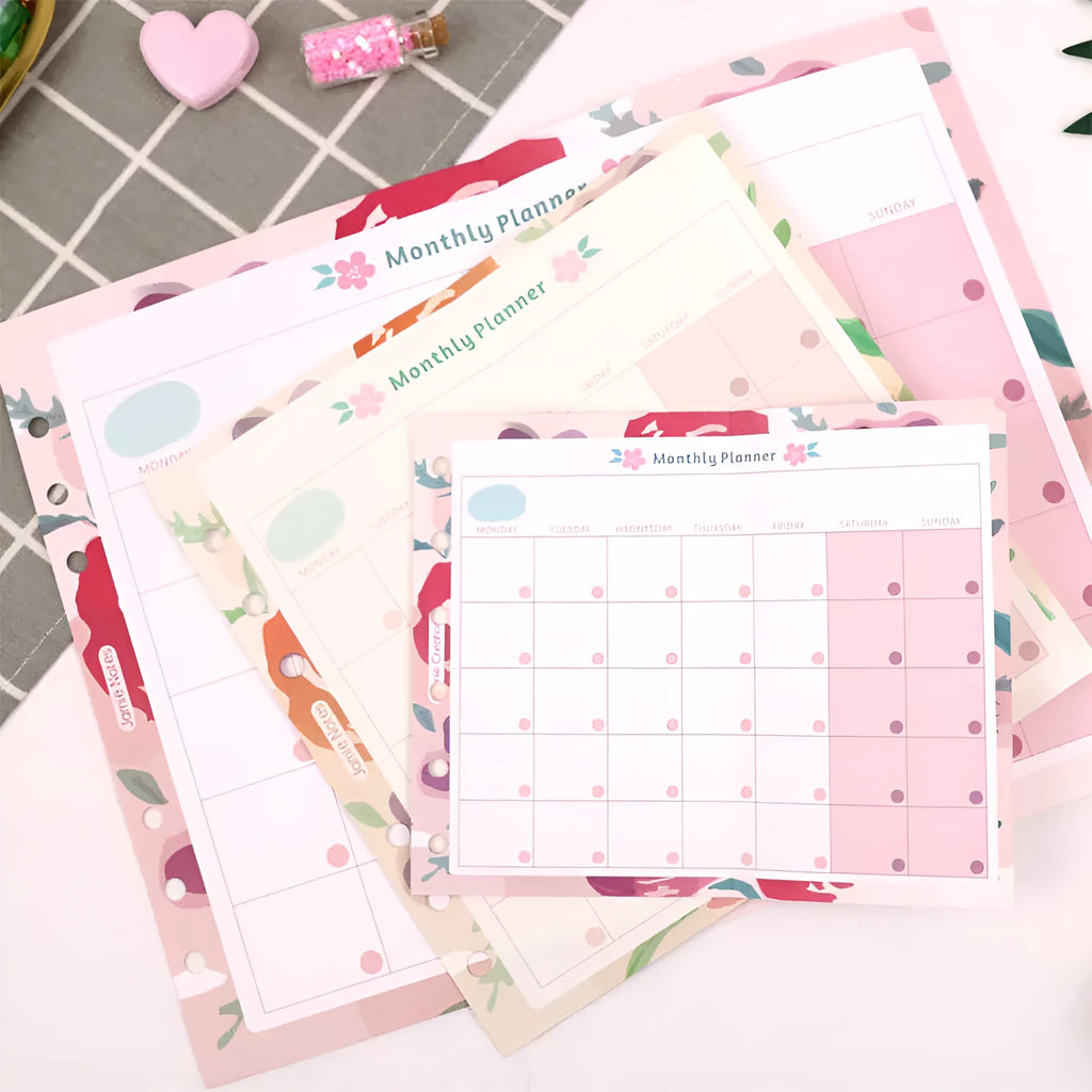 Handbook loose-leaf refill showing A7, A6 and A5 sizes in Symphony tri-fold and Floral Monthly Plan designs