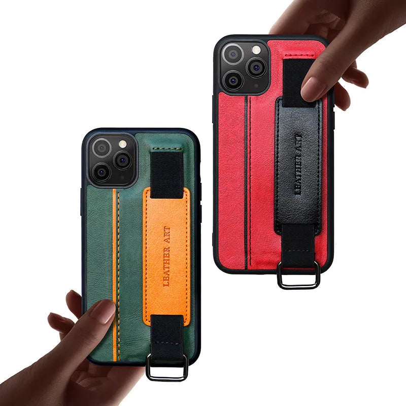 Brown imitation leather iPhone case with a wrist strap and decorative stripes.