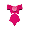 Women's floral hollow-out one-piece swimsuit with a separate matching blue skirt on a mannequin.
