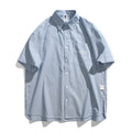 Blue striped short-sleeved shirt overalls with cardigan style on mannequin