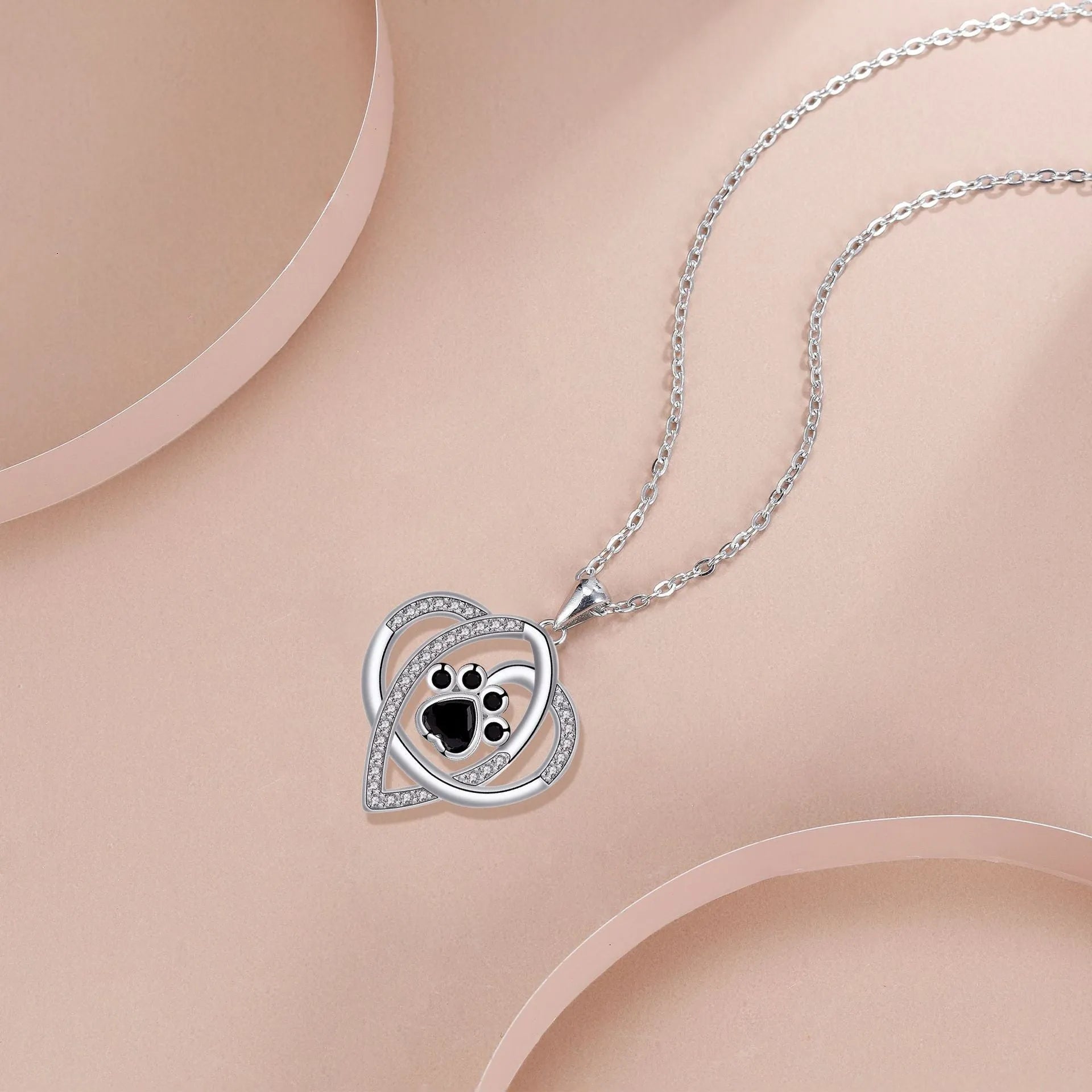 Dog and cat paw prints necklace with copper pendant on cross chain