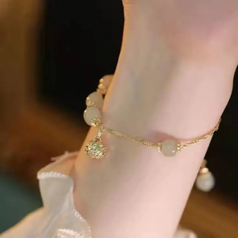 Chinese style glass bamboo leaf bracelet for women with manual craft details.