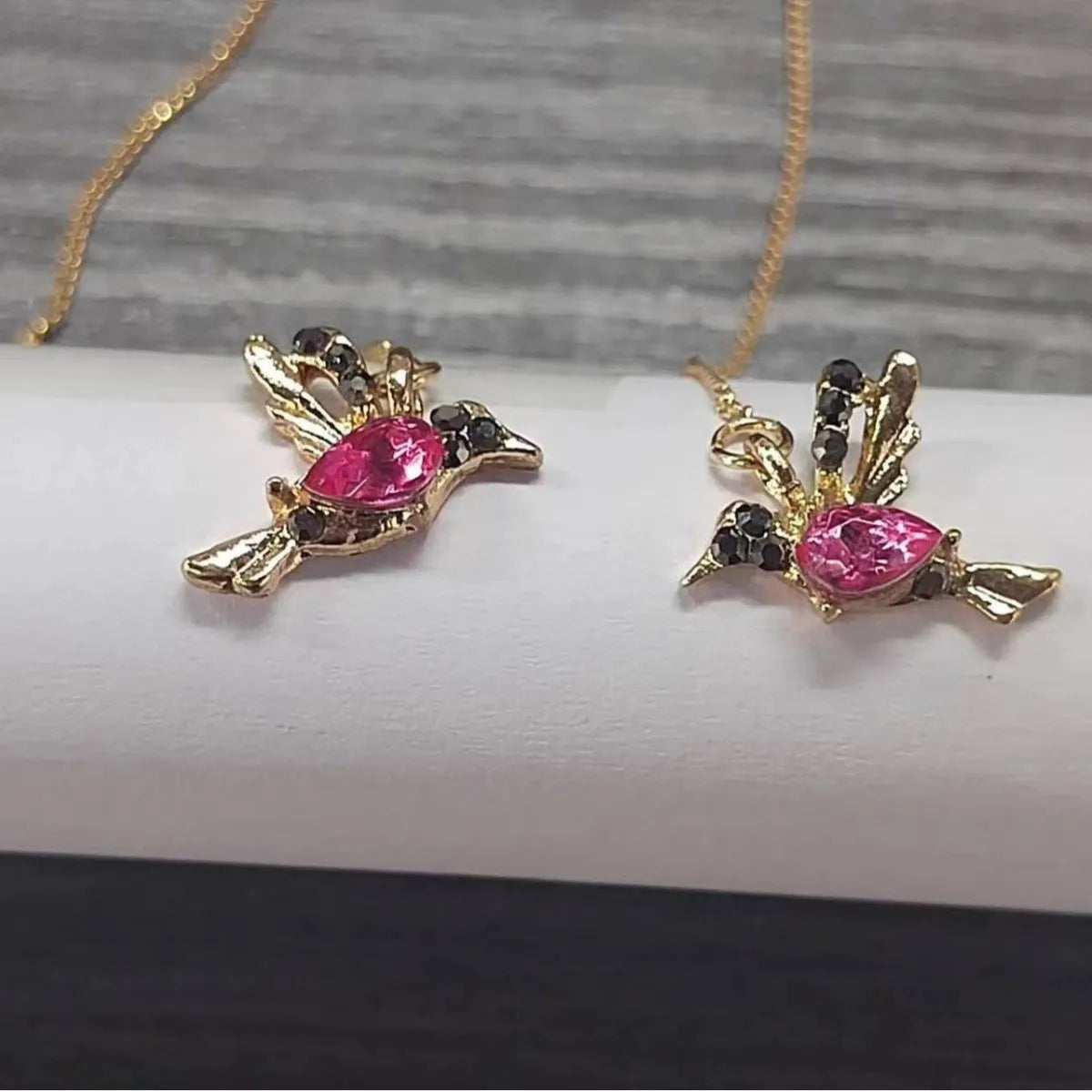 Women's long style bird hanging dangle earrings with mixed zirconium wing details in alloy construction
