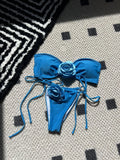 Solid colour women's tube top swimsuit with drawstring straps on a mannequin.