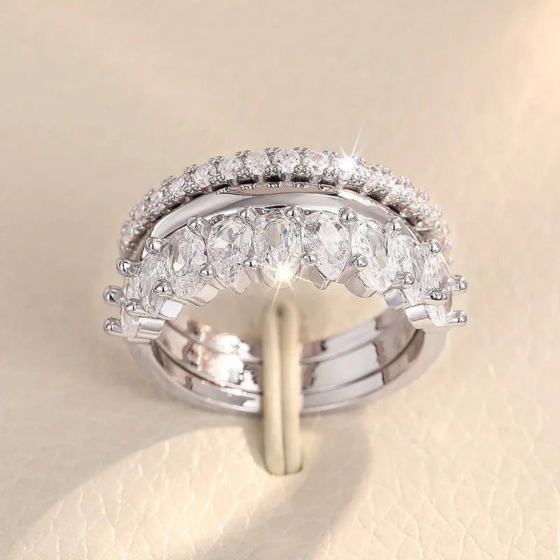 Geometric copper ring three-piece set with zircon inlay white gold colour on display