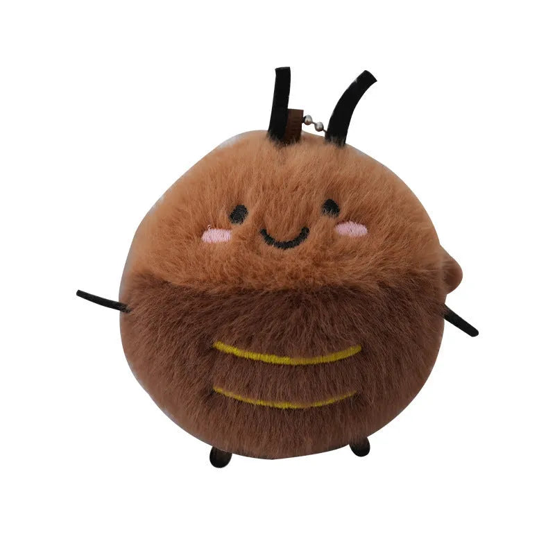 Small mink velvet cockroach pendant plush toy doll with black eyes, 8cm height, on a light background