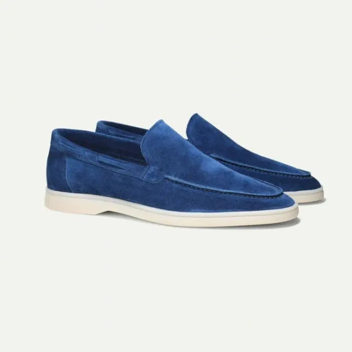 Men's matte suede flat shoes in sky blue with rubber sole and round toe, shown on plain background