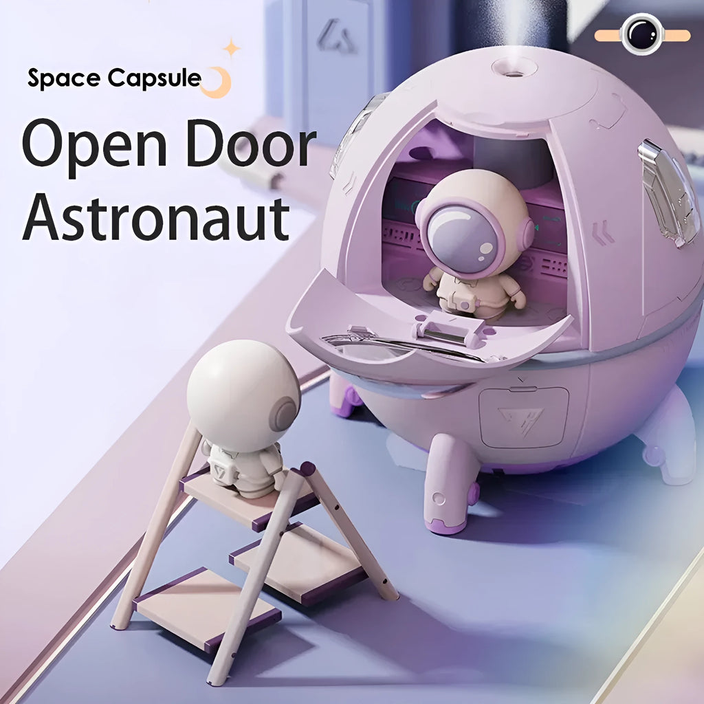 Astronaut-shaped portable USB humidifier with colourful LED light on a desk