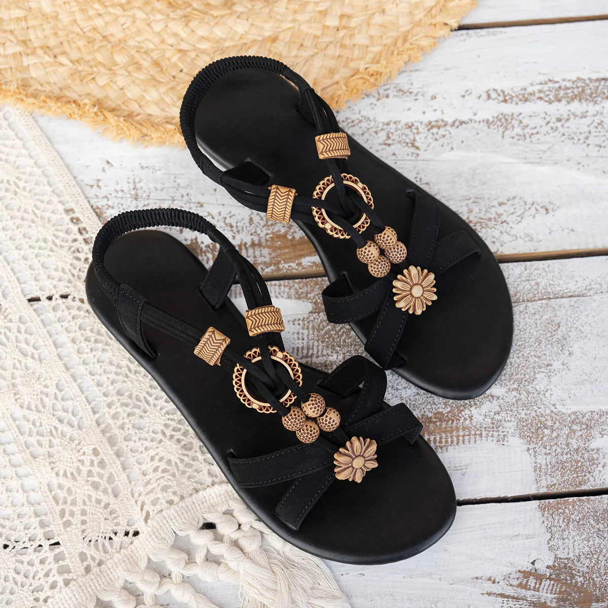 Black women's ethnic style flat beach sandals with beaded weave design and elastic band