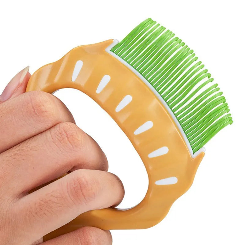 Shell-shaped pet grooming brush for dogs and cats in green colour with anti-slip handle