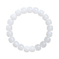 White Hetian jade barrel bead bracelet on a wrist, showing the smooth stone beads and unisex casual design.