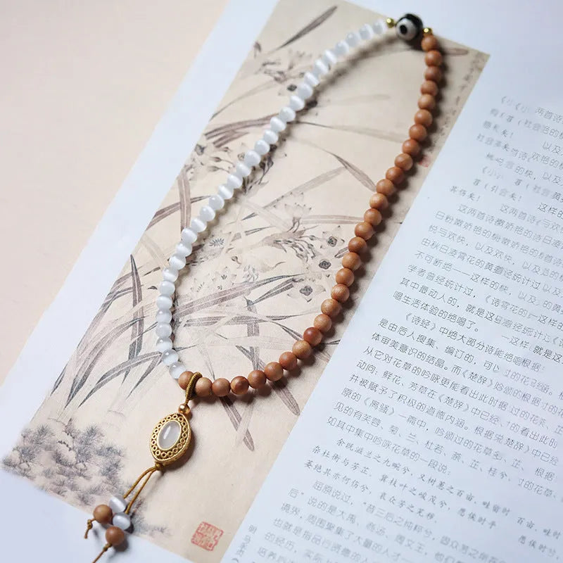 Sandalwood double ring bracelet with Opal Tibetan beads in mixed materials