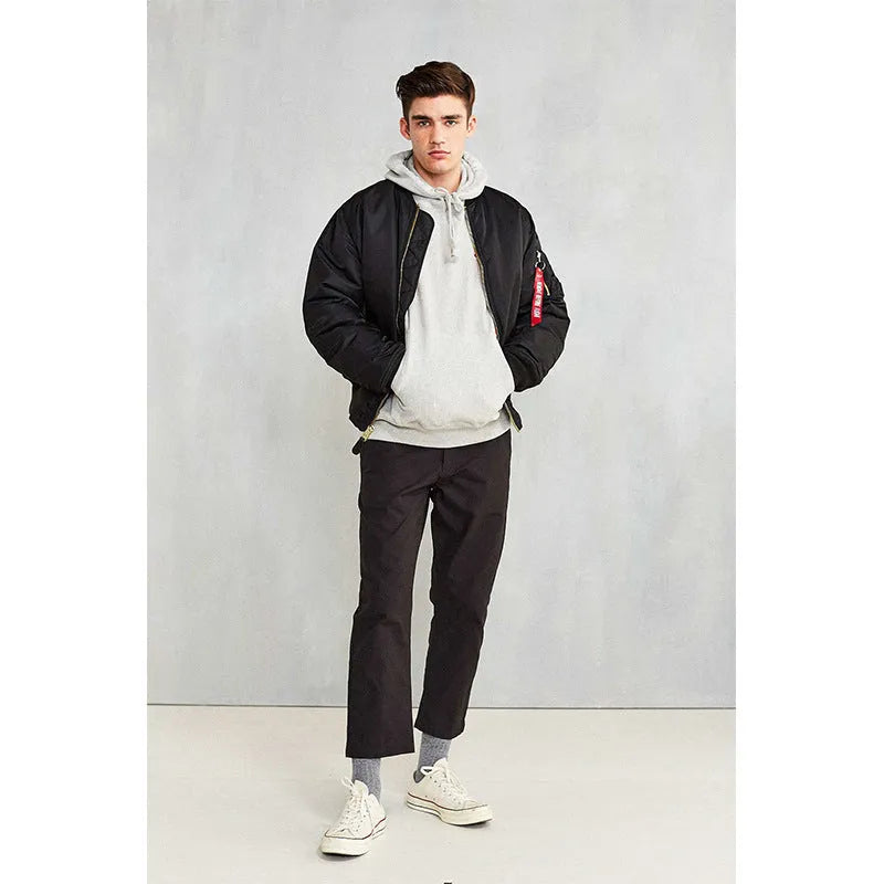 Men's army green loose-fitting nylon pilot jacket with cotton padding from American workwear collection.