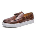 Men's plus size leather-look sneakers with tassel decoration in black, available in sizes 38 to 47