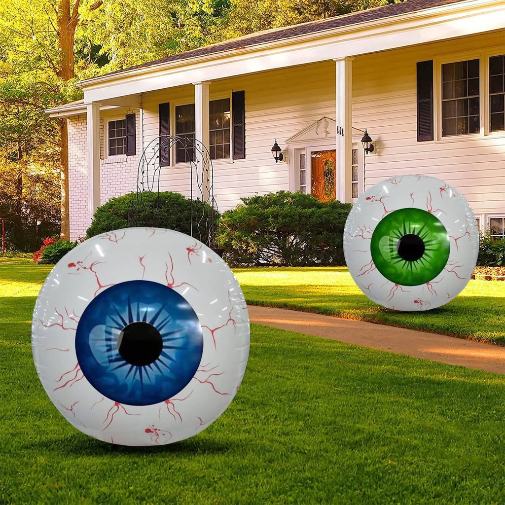 Green Halloween eyeball balloon with red bloodshot veins, shown inflated to 40cm diameter.