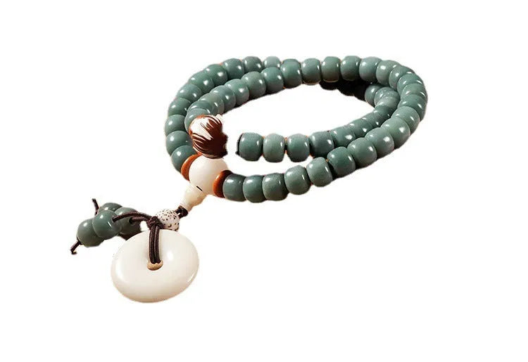 White jade bodhi seed bracelet with green sandalwood beads and double ring safety buckle