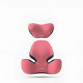 Black and grey memory foam car lumbar support pillow and matching headrest on a car seat.
