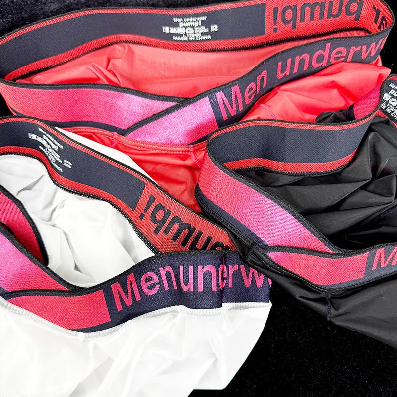 Men's black low waist underwear with a red and white gradient laser pattern, seamless design.